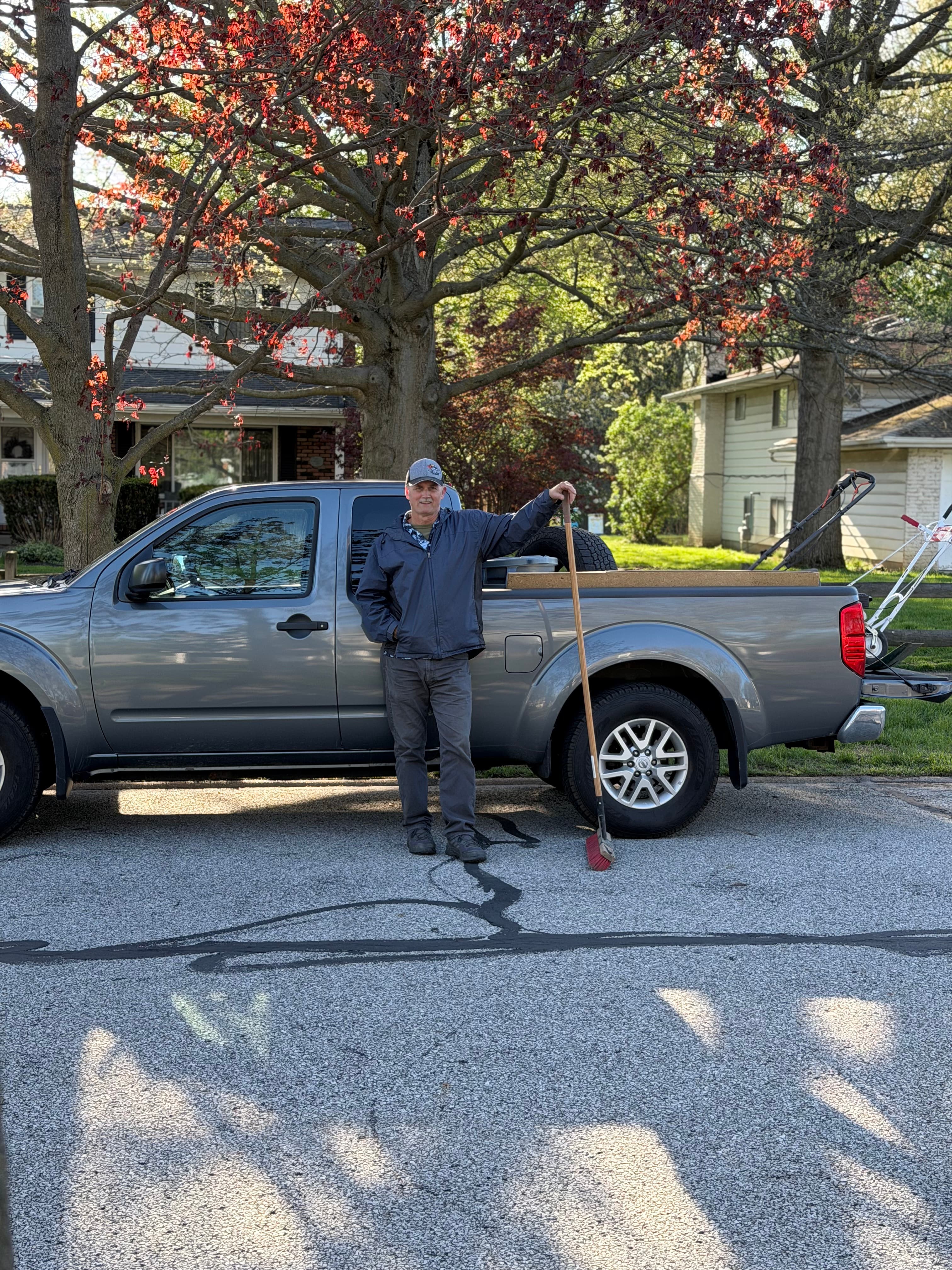 Just Edging owner in front of work truck